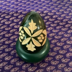 Hand carved Wooden Egg painted green with display stand